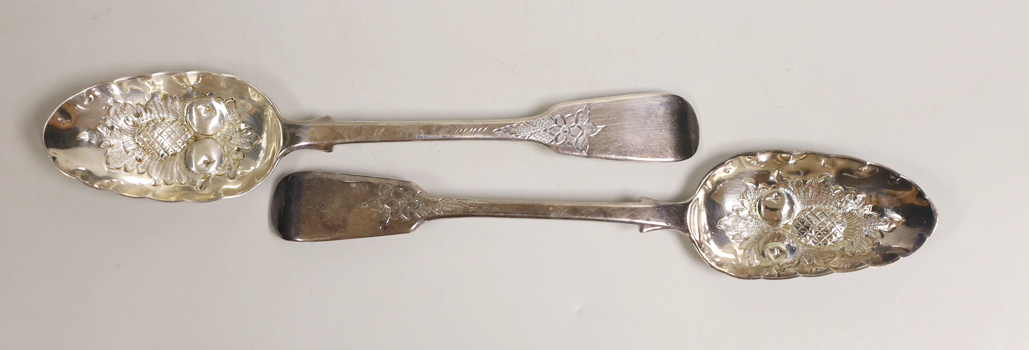 A pair of Victorian silver fiddle pattern 'berry' spoons, George Adams, London, 1850, 22.7cm, 4.8oz.